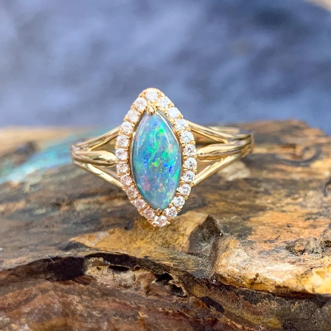 18kt Yellow Gold marquise shape cluster and Black Opal ring