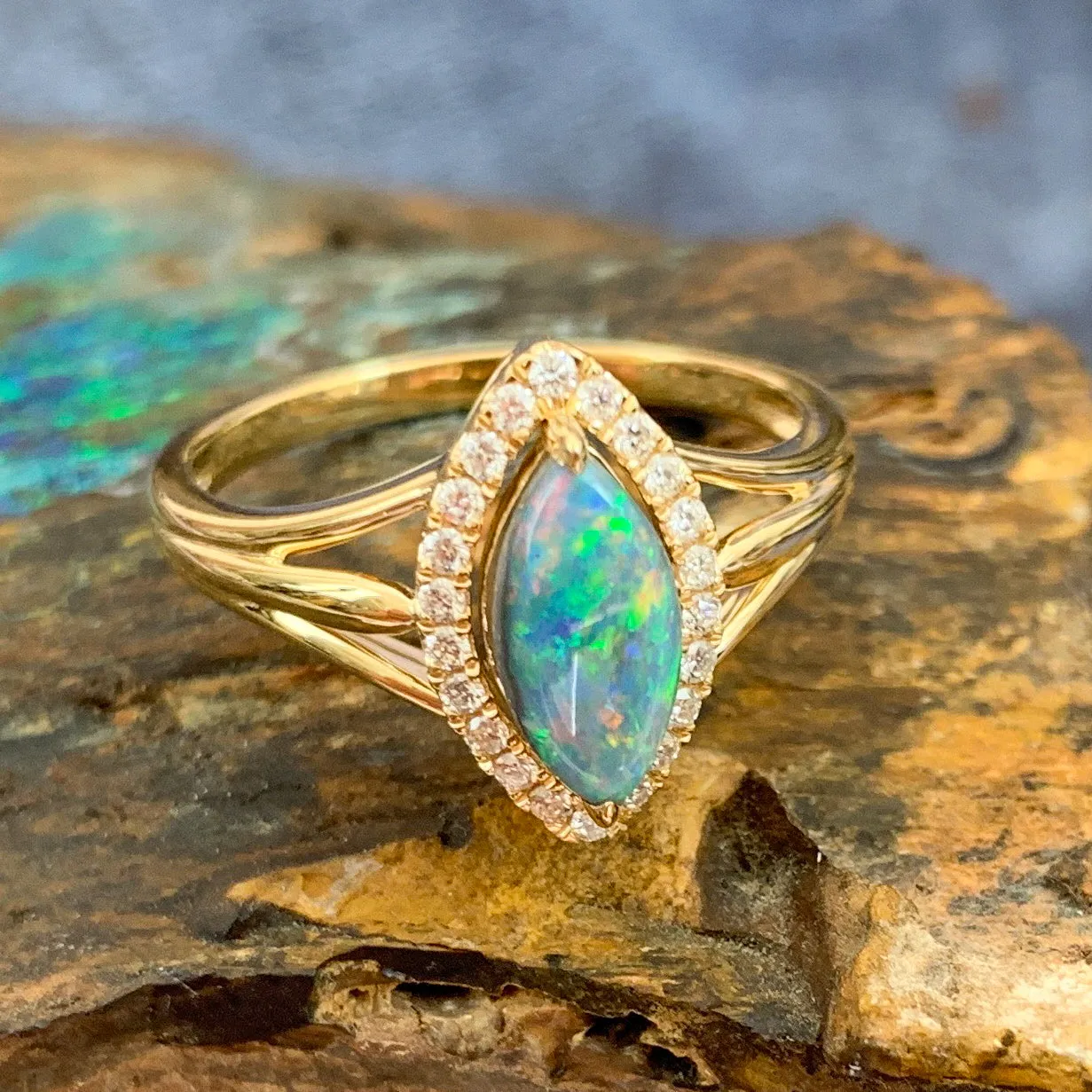 18kt Yellow Gold marquise shape cluster and Black Opal ring