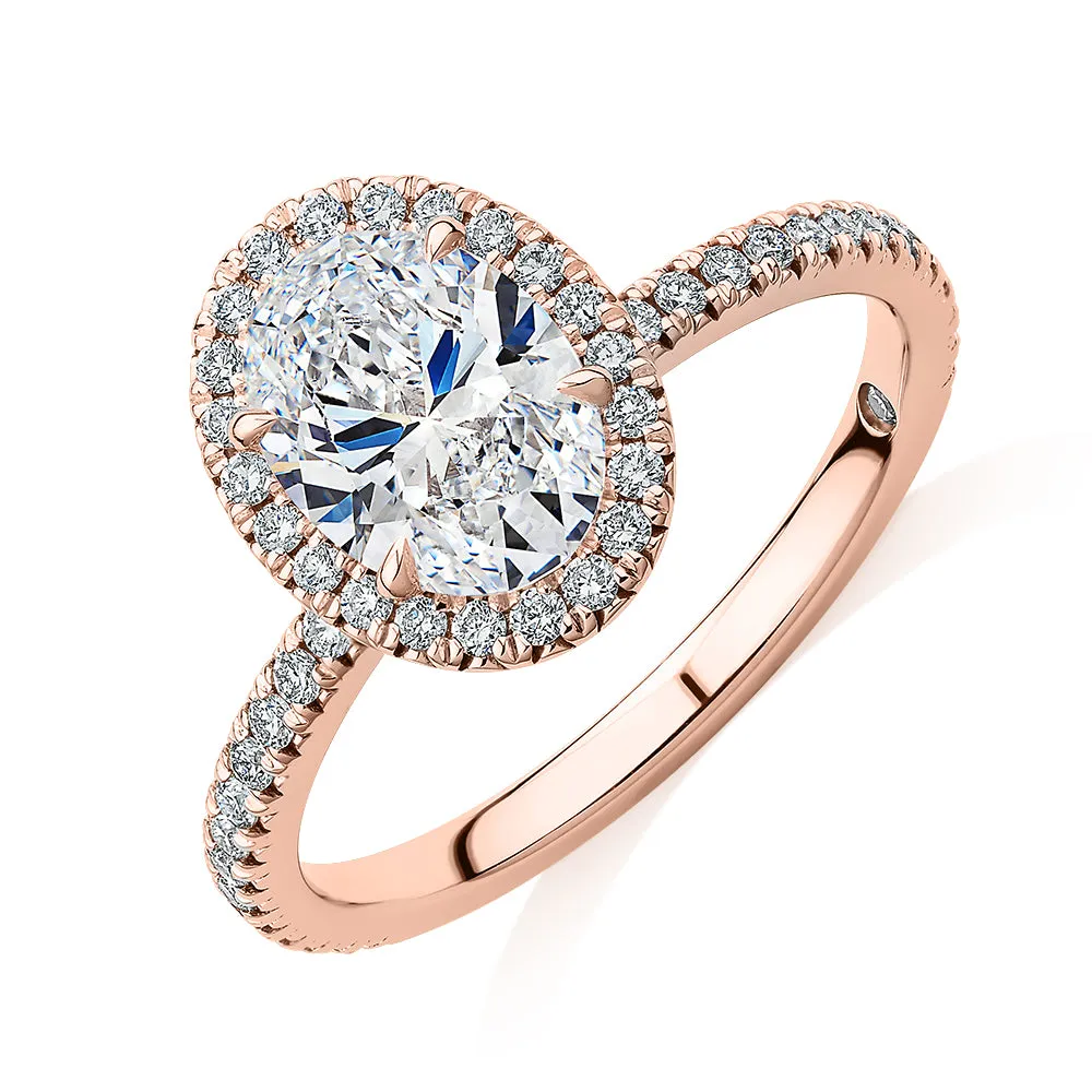 Signature Simulant Diamond 1.89 carat* TW oval and round brilliant halo engagement ring in 14 carat rose gold
